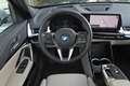 BMW iX1 xDrive30 xLine 67 kWh / Panoramadak / Trekhaak / S Groen - thumbnail 2