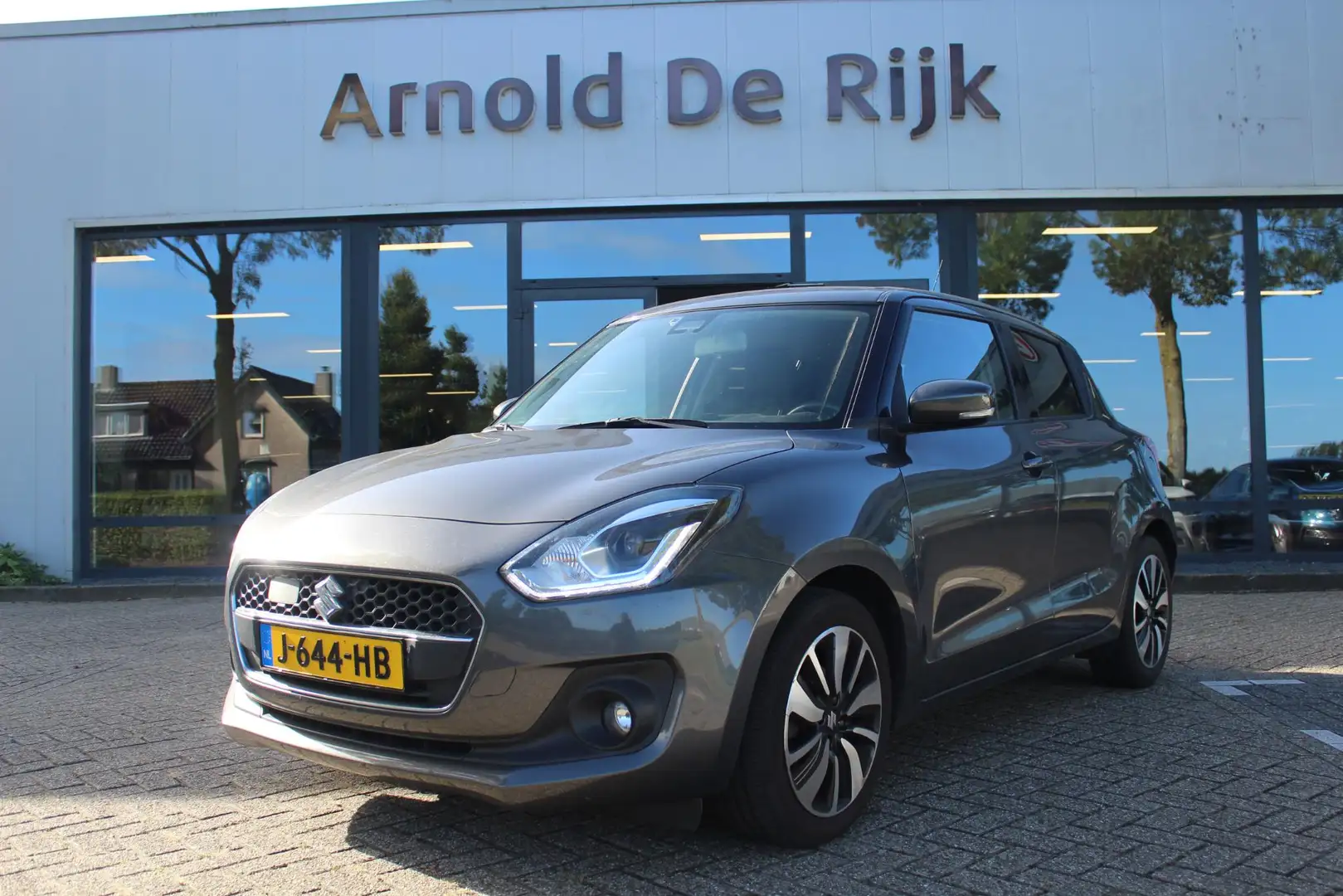 Suzuki Swift 1.2 Stijl Smart Hybrid Grijs - 1