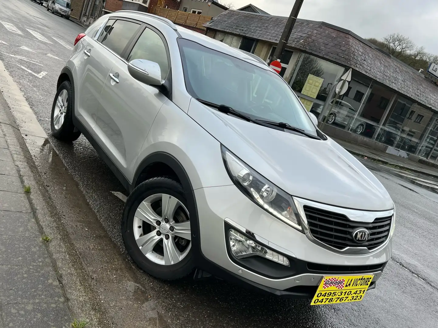 Kia Sportage 1.7 CRDi 2WD CLim/Jantes/Gps vente Marchand & ex Grijs - 1