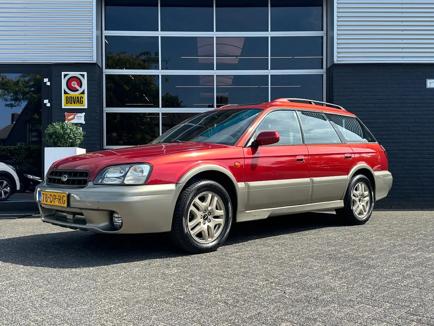 Subaru Legacy Outback 2.5 Outback AWD, Automaat, Airco, Pano, Ra Rot - 1