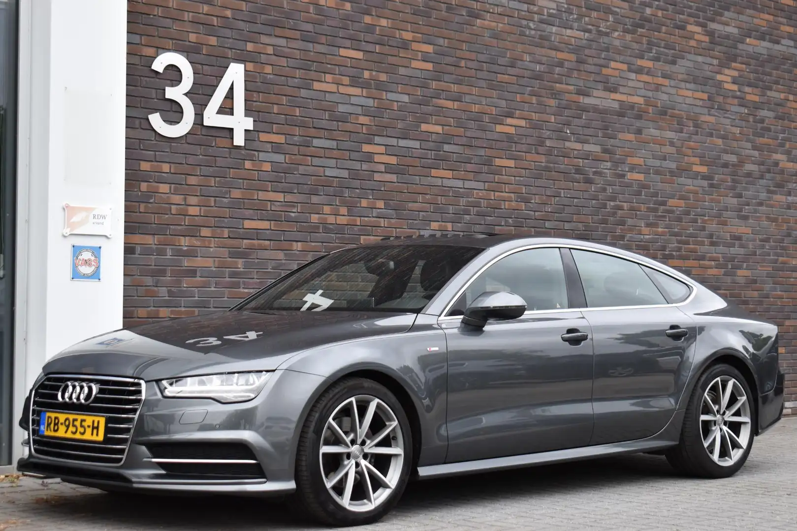 Audi A7 Sportback 1.8 TFSI S line PANO LEDER LMV 88000KM! Grijs - 2