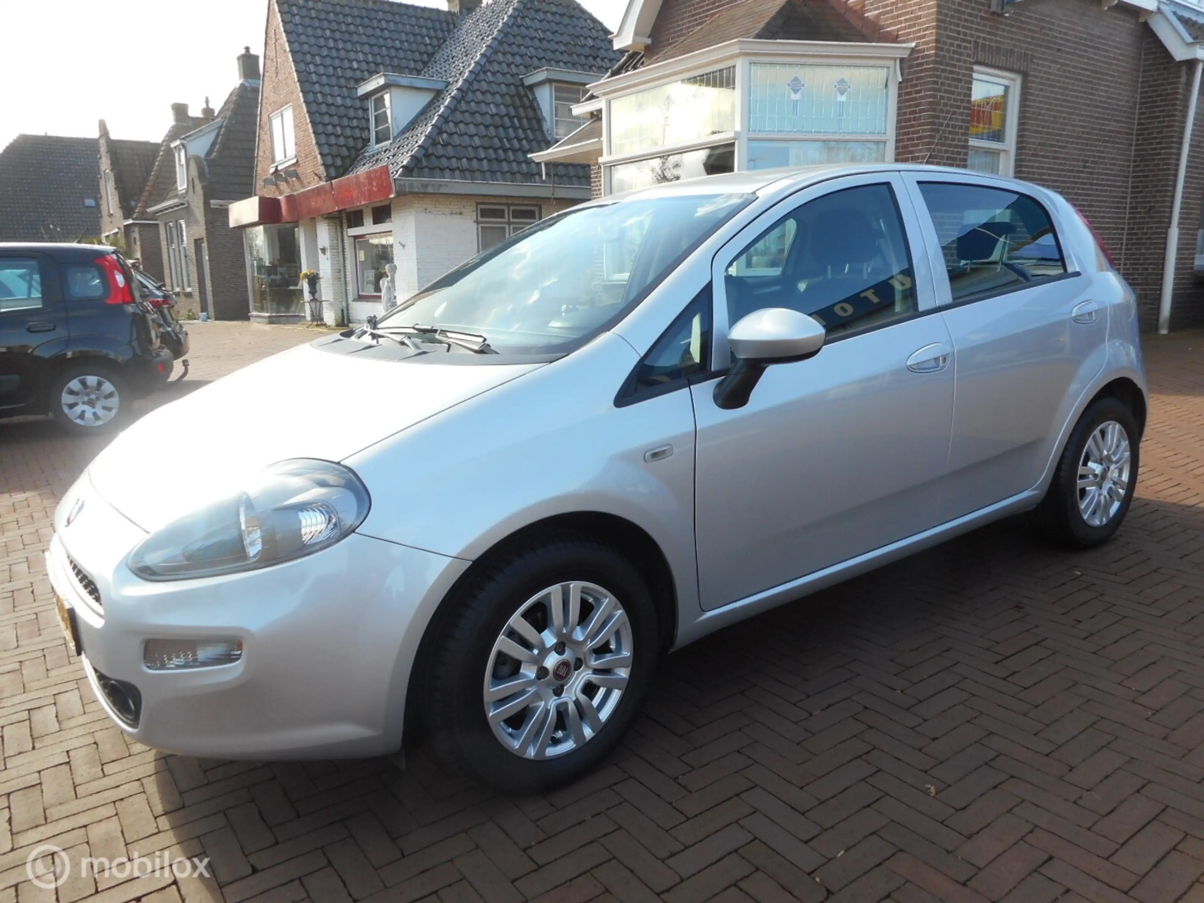 Fiat Punto TwinAir Turbo 100PK Edizione Cool 5drs METALLIC LA — photo 3