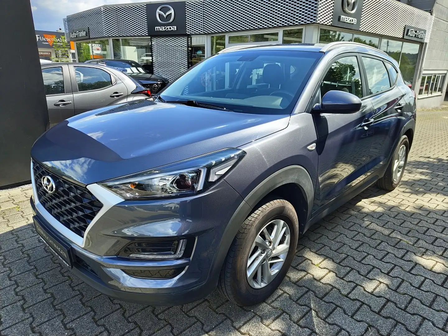 Hyundai TUCSON 1.6 2WD Grijs - 1