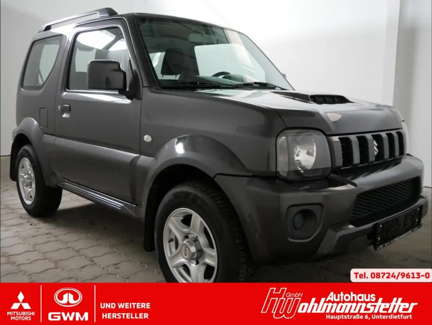 Suzuki Jimny 1.3 ALLRAD, Sitzheitzung, Klima, Radio/CD, Alu fel Grijs - 1