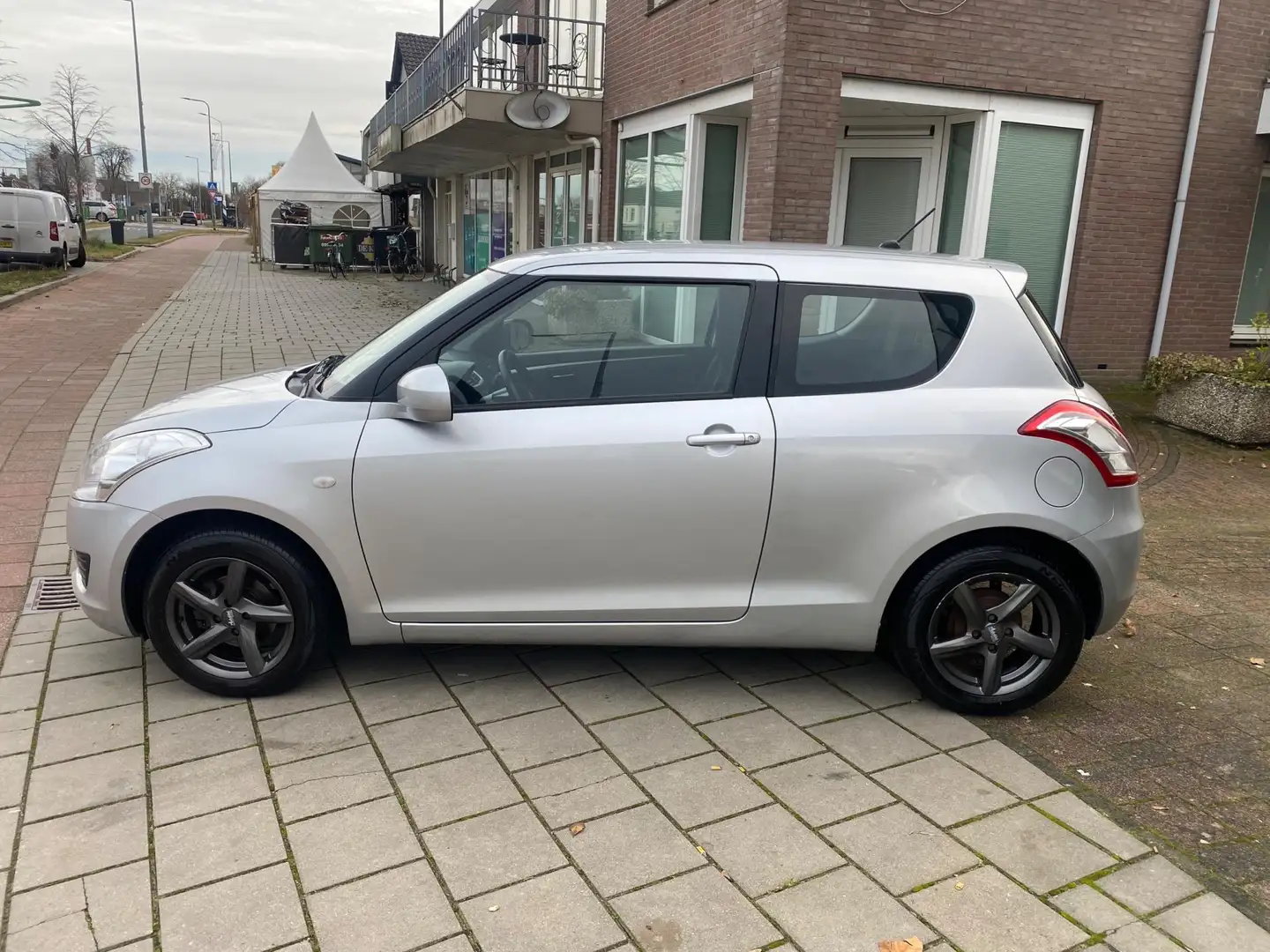 Suzuki Swift 1.2 Exclusive airco el ramen lm velgen 78499 km Zilver - 2