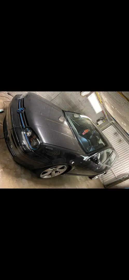 Volkswagen Golf 1.9 TDi Highline - 1
