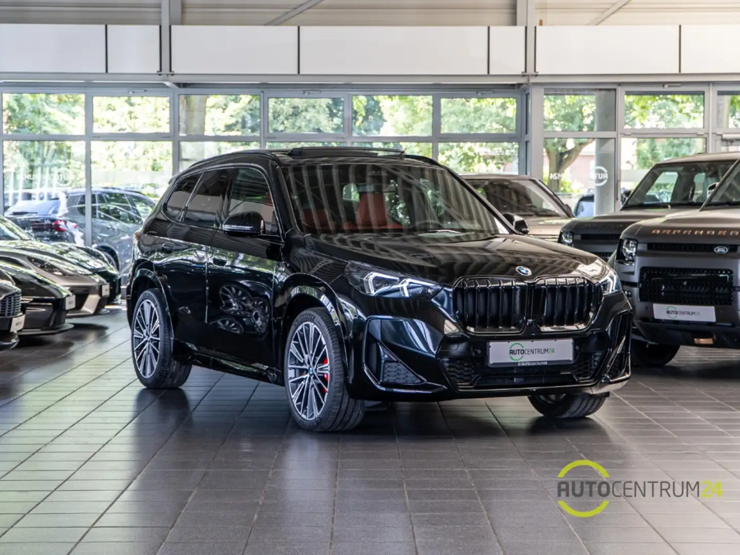 BMW X1 20i M Sport Inno Pano HUD Pano Travel Comfort Schwarz - 1