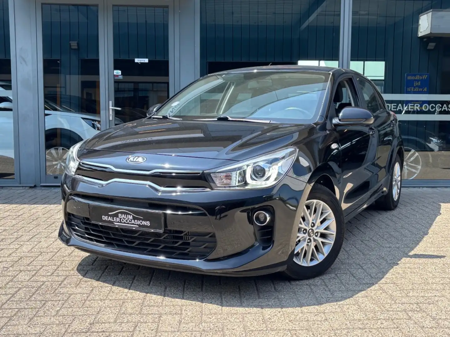 Kia Rio 1.0 TGDI DYNAMIC PLUS AUTOMAAT AIRCO NAVI CRUISE Zwart - 1