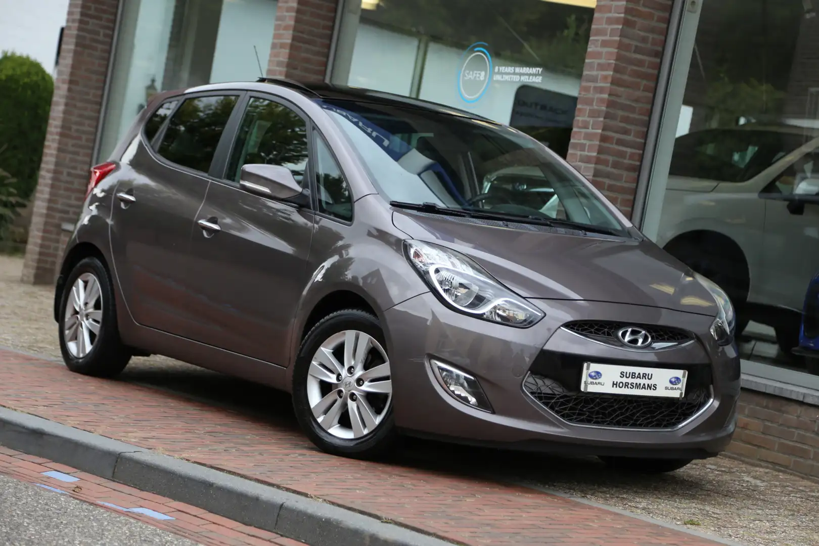 Hyundai iX20 1.6i i-Catcher Automaat Schuifdak Leer Navi Camera Brun - 1