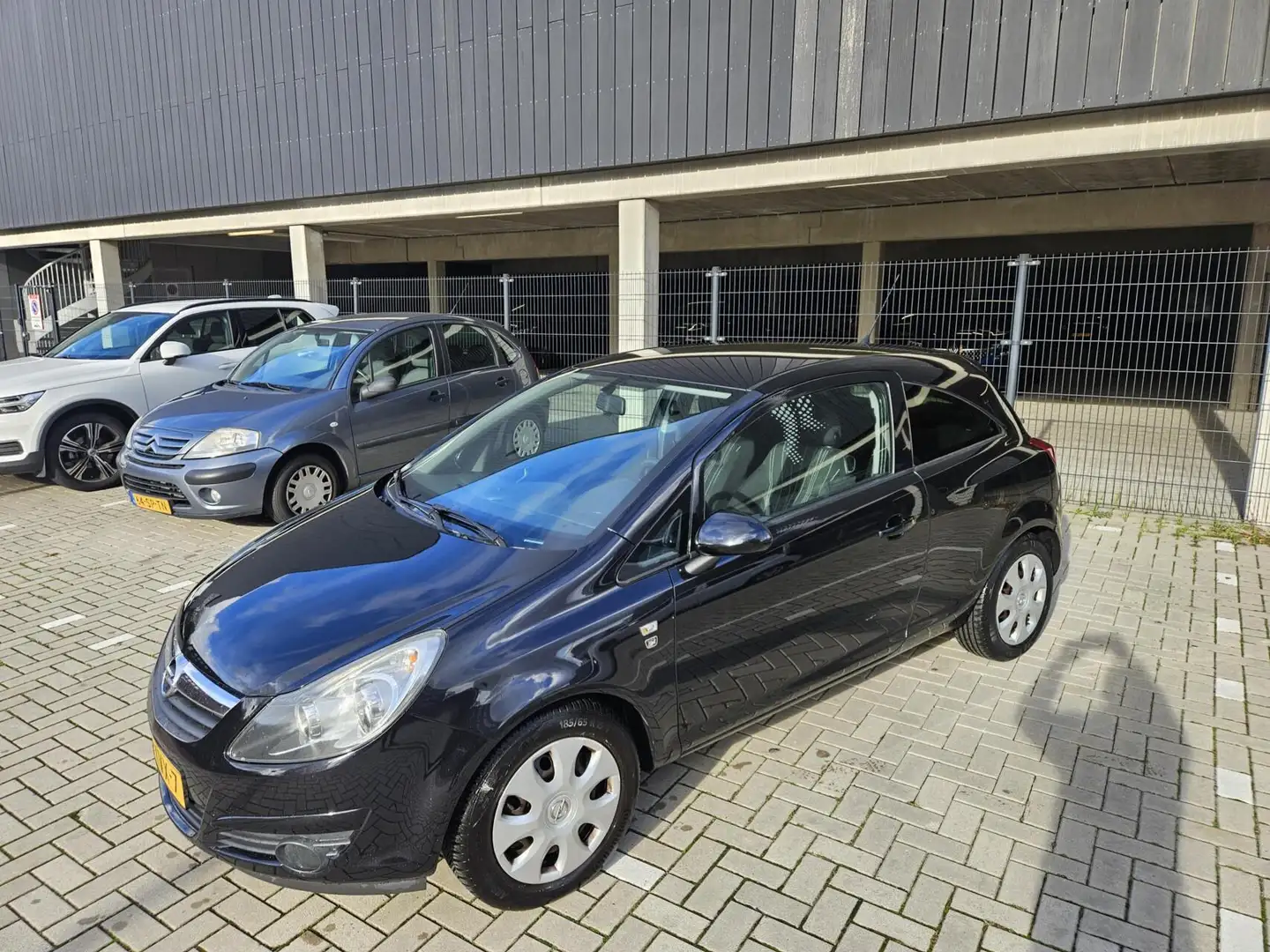 Opel Corsa 1.2-16V NAP Airco Cruise Zwart - 1