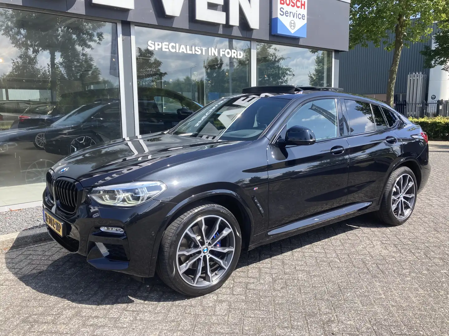 BMW X4 M40i High Executive 354pk/260kW Automaat 8-traps | Schwarz - 2