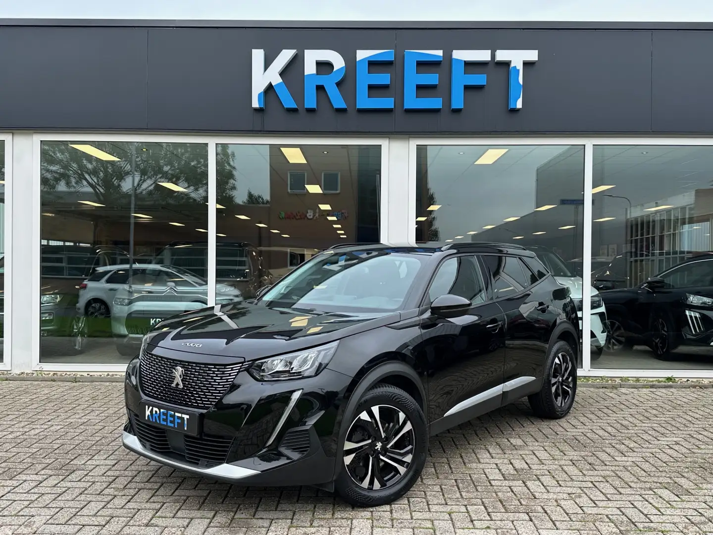 Peugeot 2008 1.2 PureTech Allure Pack App connect | 1 jaar gara Noir - 1