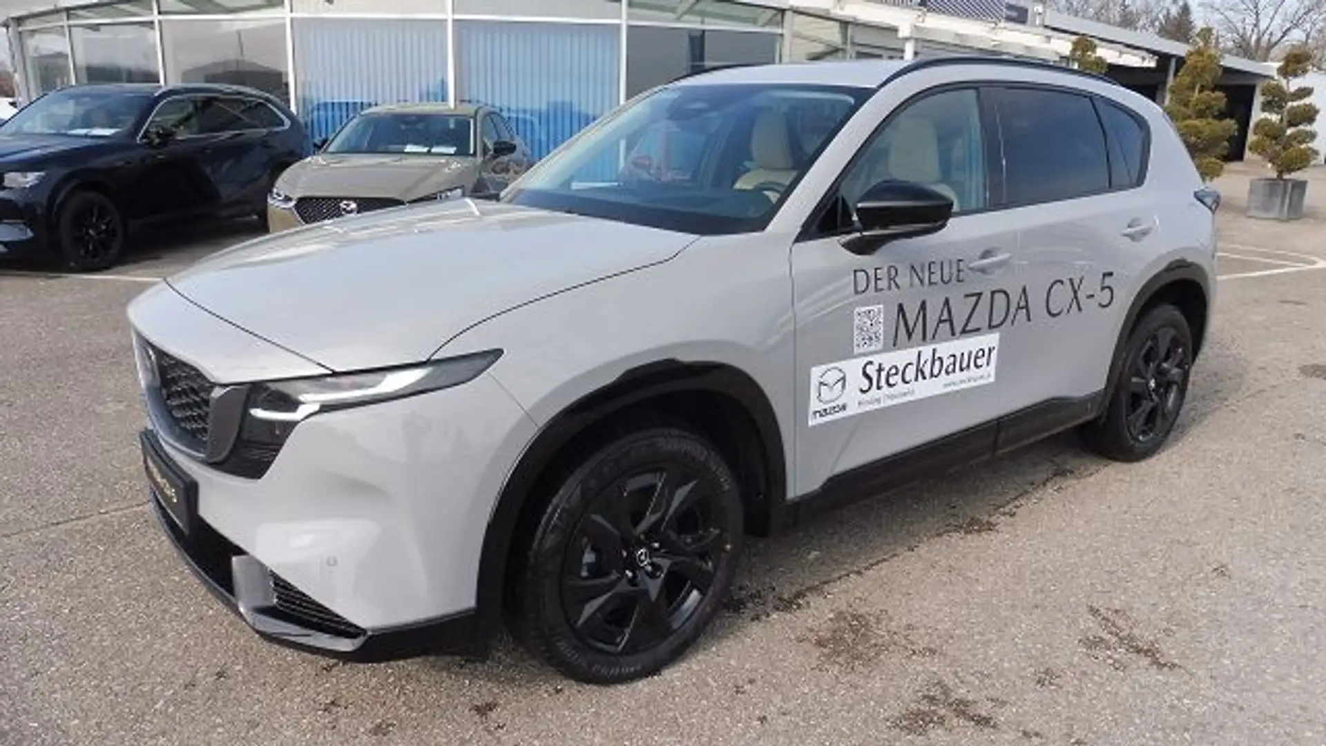 Mazda CX-5 e-Skyactiv G141 MHEV Homura Aut. Grau - 1