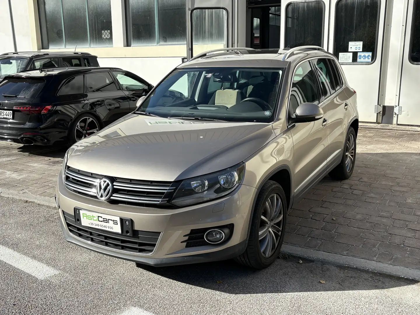 Volkswagen Tiguan 1.4 TSI 4Motion Sport & Style Navi Panoramadach Beige - 1