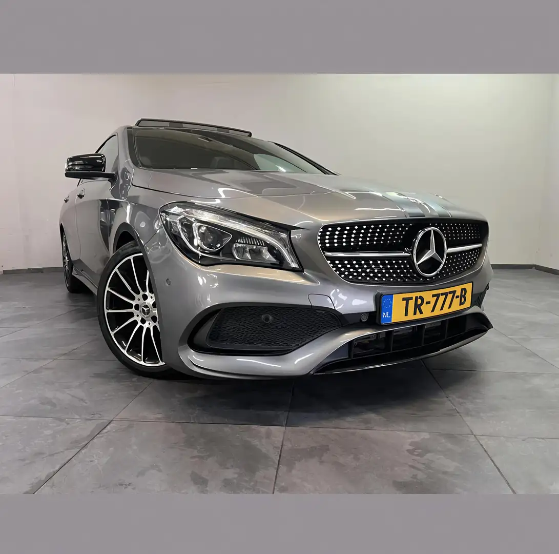 Mercedes-Benz CLA 180 AMG WHITE ART EDITION NL AUTO NAP Grijs - 2