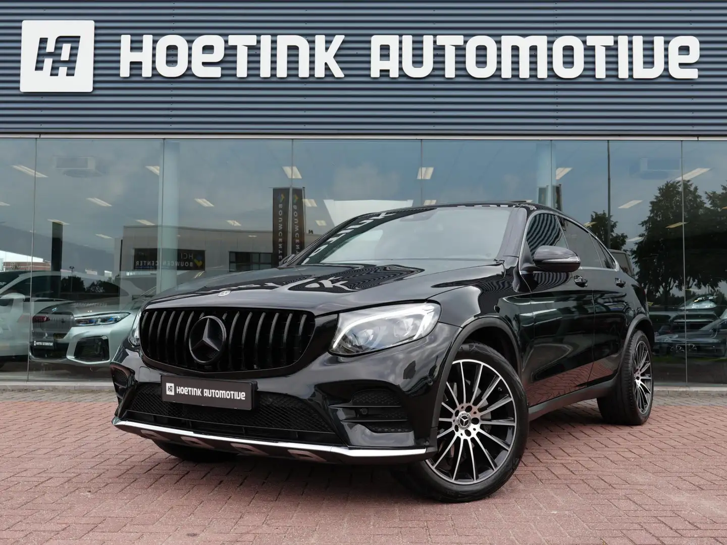 Mercedes-Benz GLC 250 Coupé 4MATIC Premium Plus | Pano | Afn trekhaak | Zwart - 1