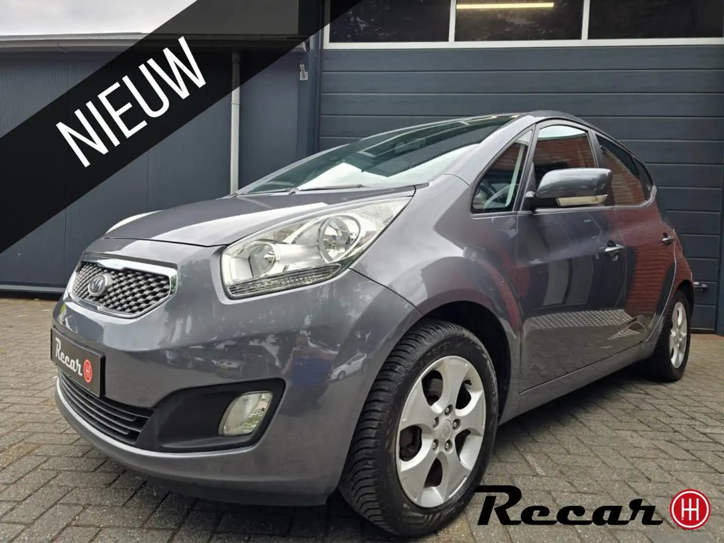 Kia Venga 1.6 CVVT X-tra/Airco/StoeV/5Drs/Pdc/Apk Grau - 1