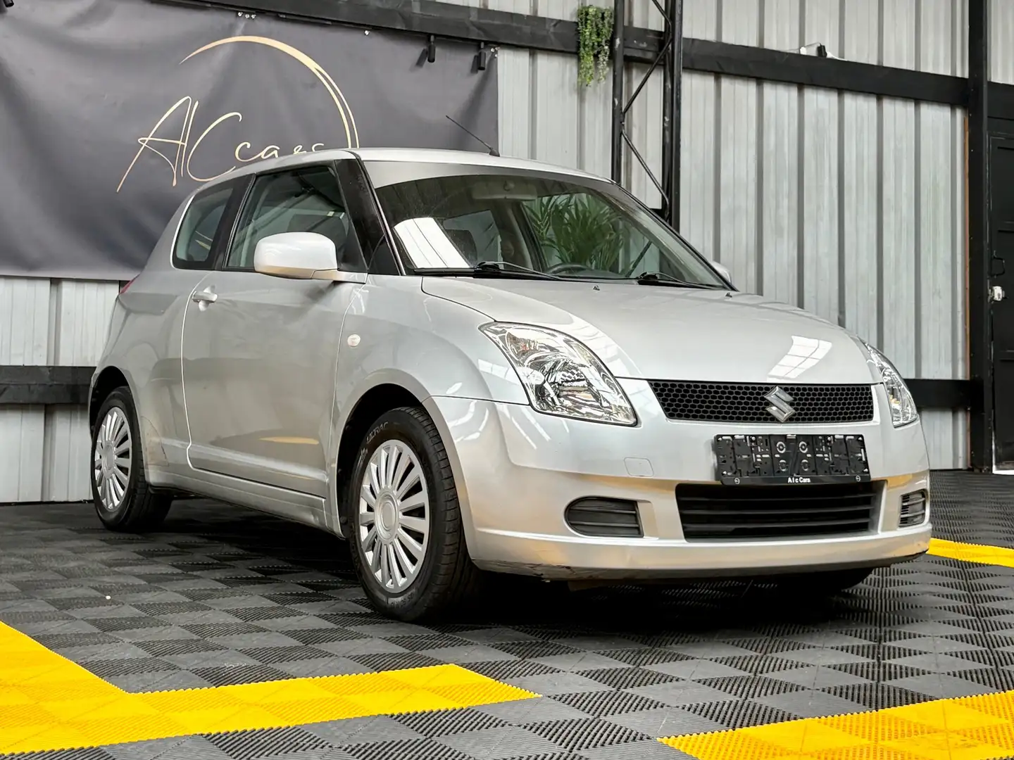 Suzuki Swift Swift 1.3i GL Airco Grijs - 1