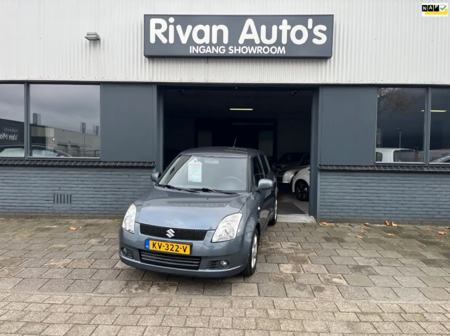Suzuki Swift 1.3 GLX Grijs - 1