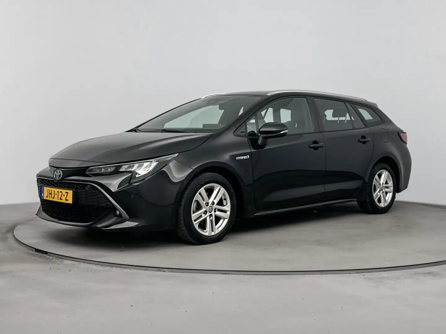 Toyota Corolla Touring Sports 1.8 Hybrid Dynamic | Garantie t/m 0 Zwart - 1