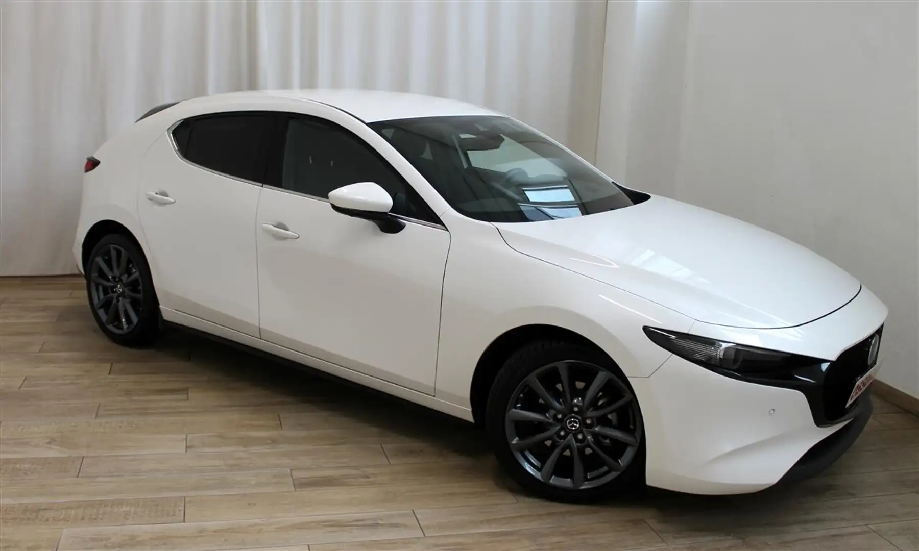 Mazda 3 2.0 BENZINA M-HYBRID EXCEED White - 1