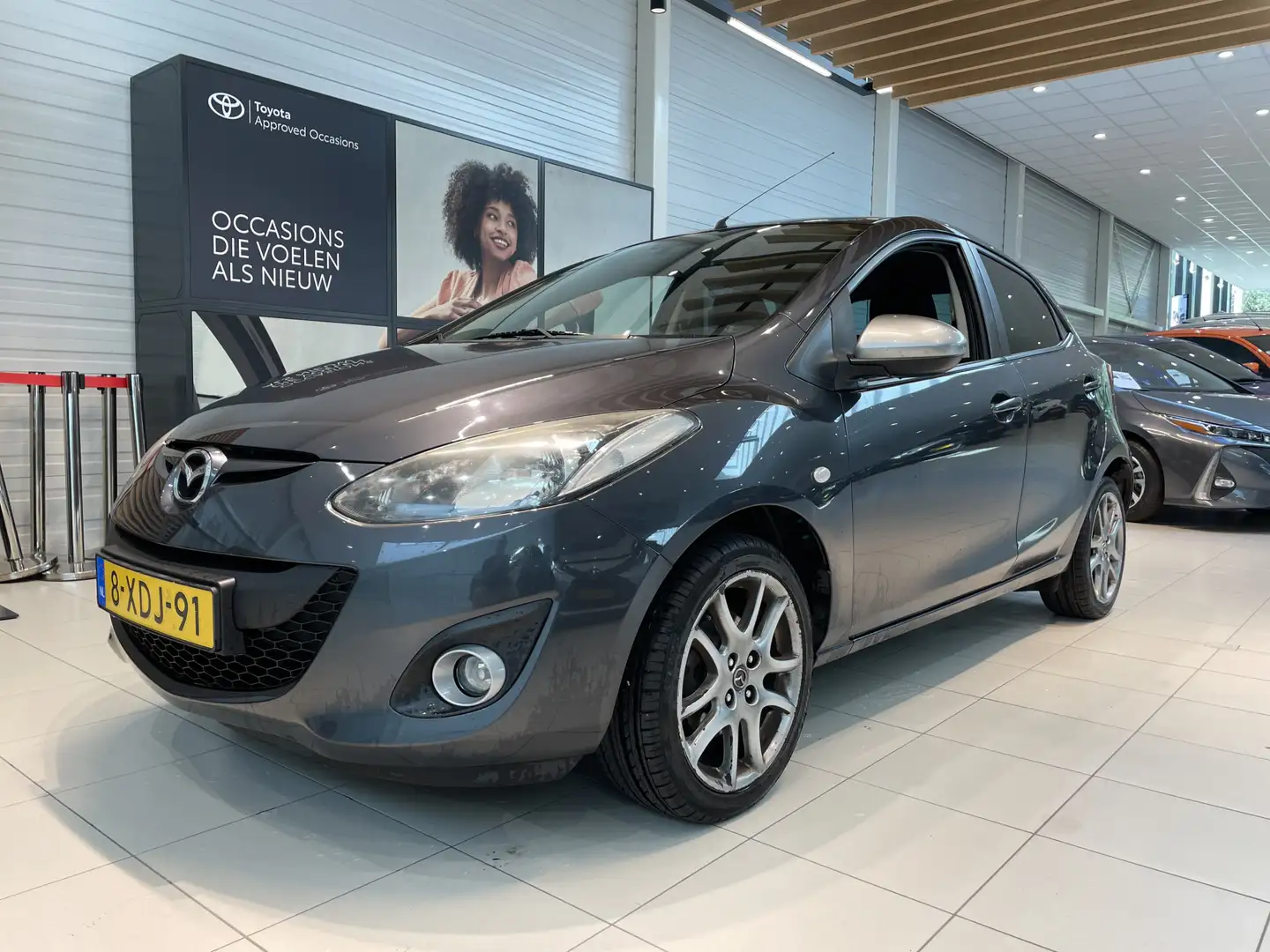 Mazda 2 1.3 TS Plus | Navi | LM velgen | Airco Grau - 1