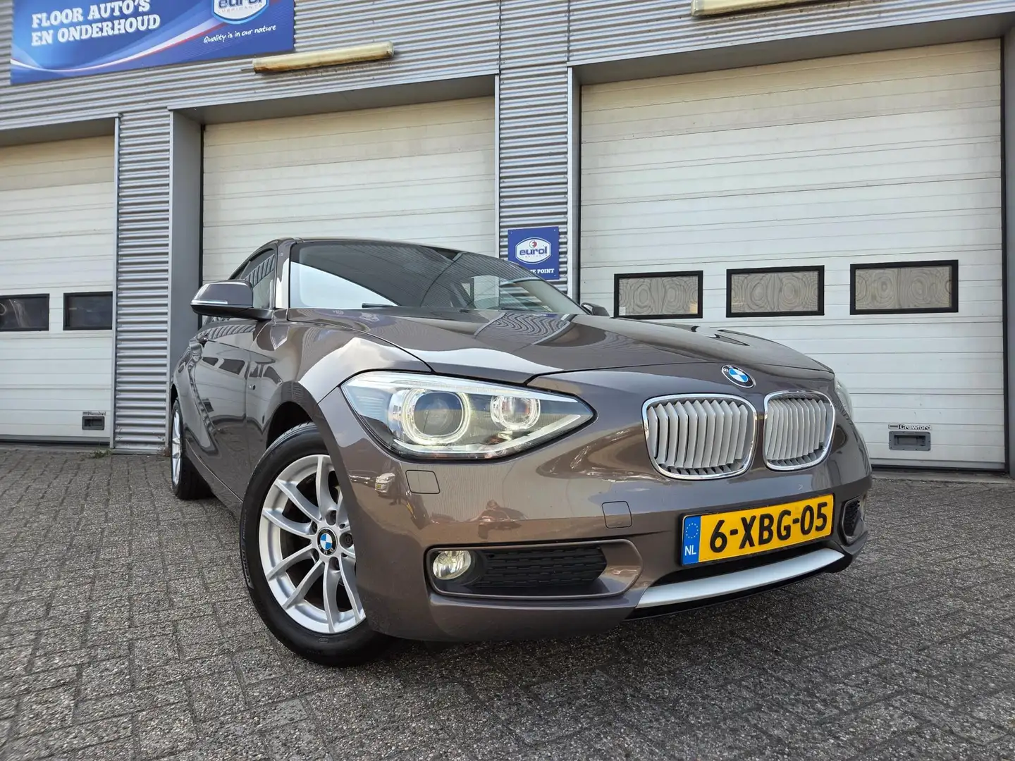 BMW 116 1-serie 116i Executive |AUTOMAAT|NAVI|SCHUIFDAK| Bruin - 2