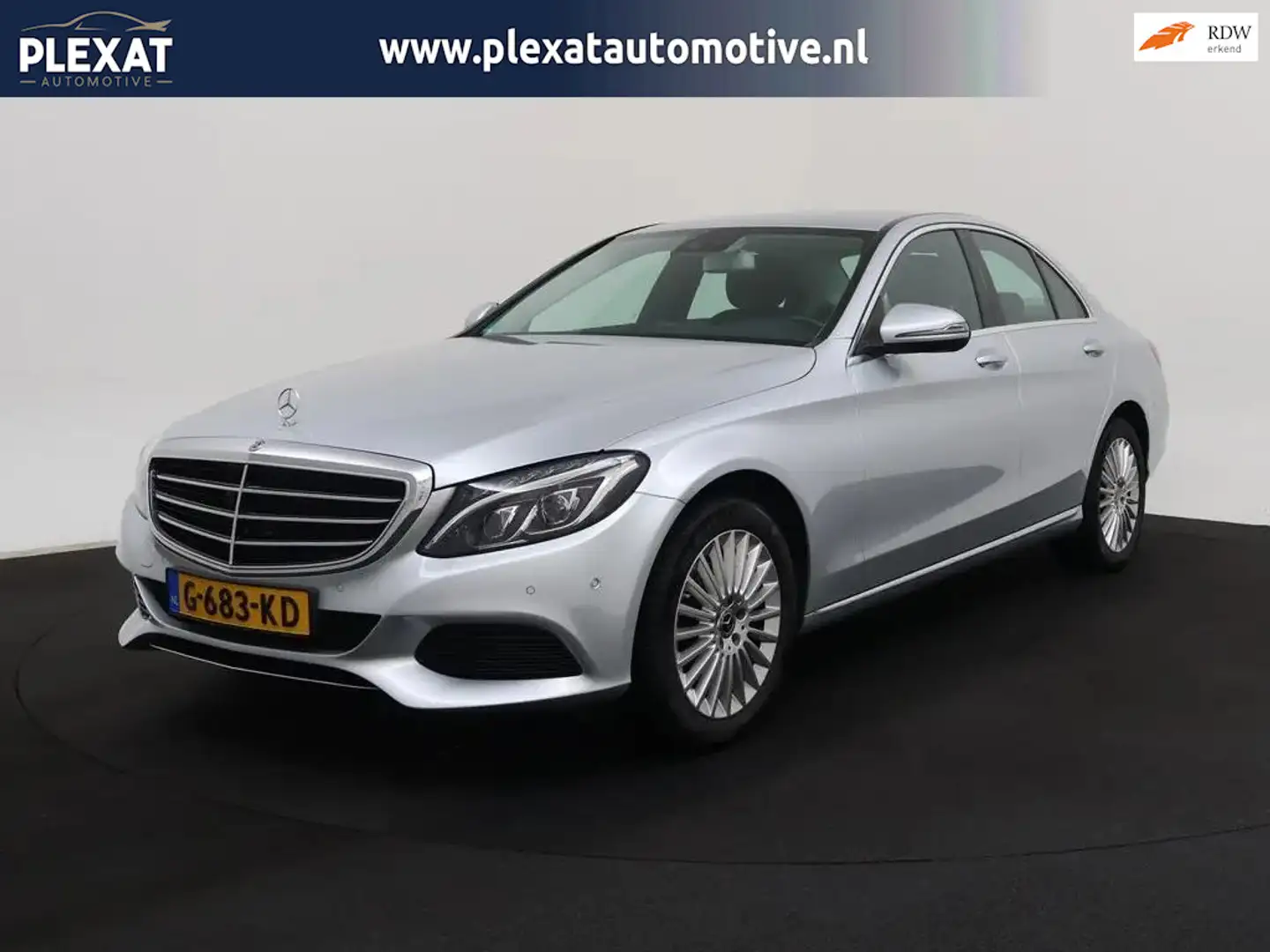 Mercedes-Benz C 180 Premium Plus Aut. | Stoelverwarmd | Dodehoek | Led Grijs - 1