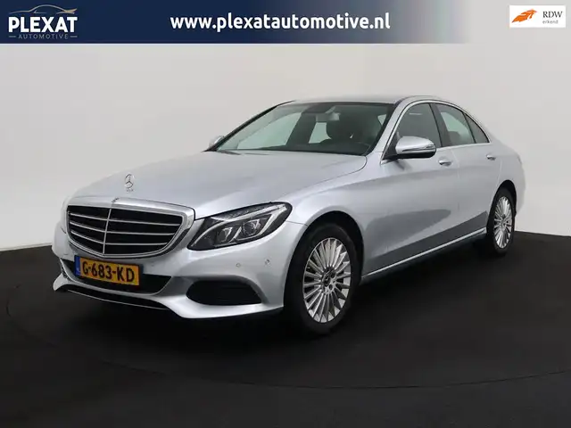 Mercedes-Benz C 180 Premium Plus Aut. | Stoelverwarmd | Dodehoek | Led