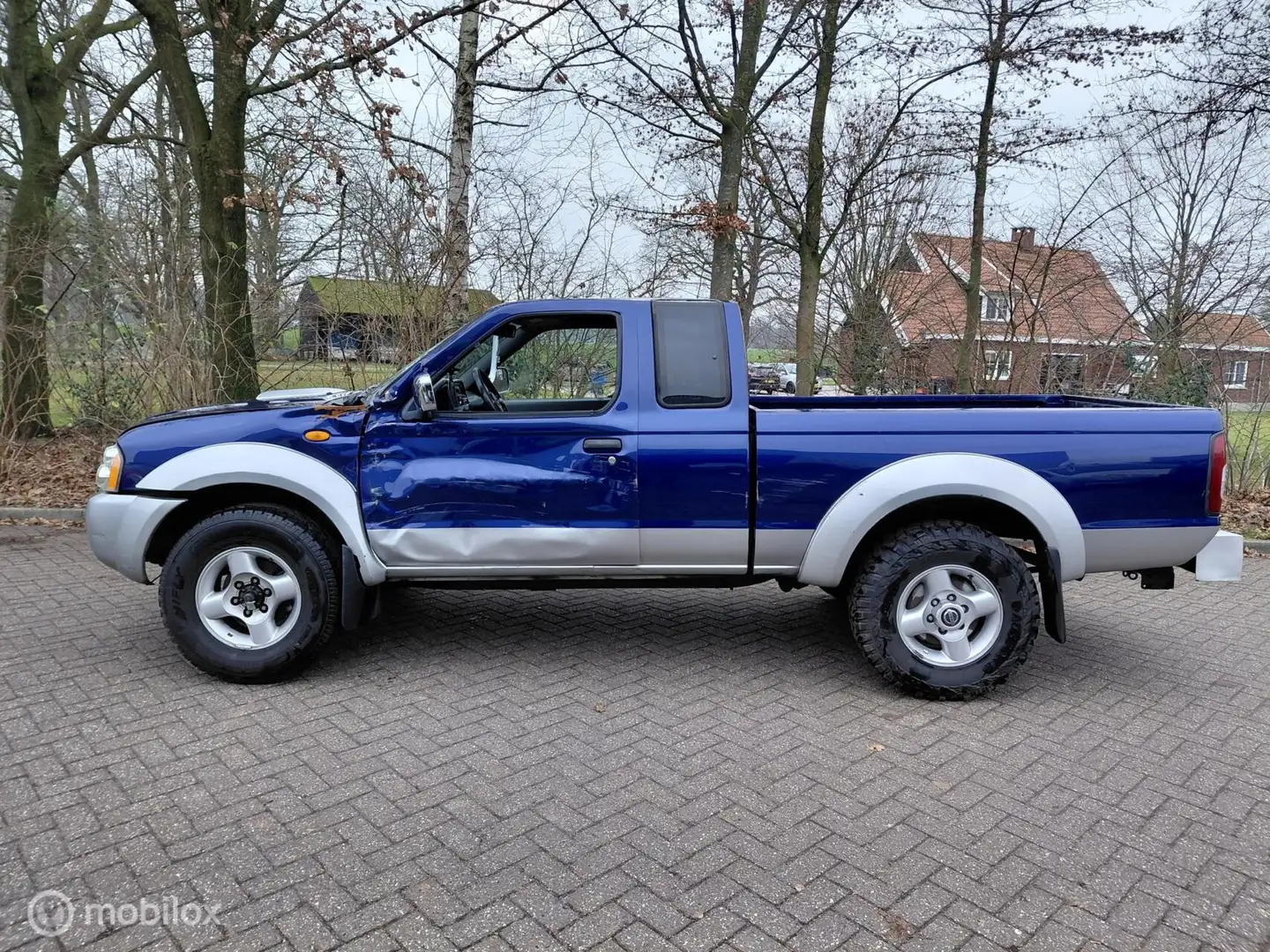 Nissan Pick Up 2.5 DTi 4X4 King Cab Airco Cruise APK 8-2026 Blau - 2