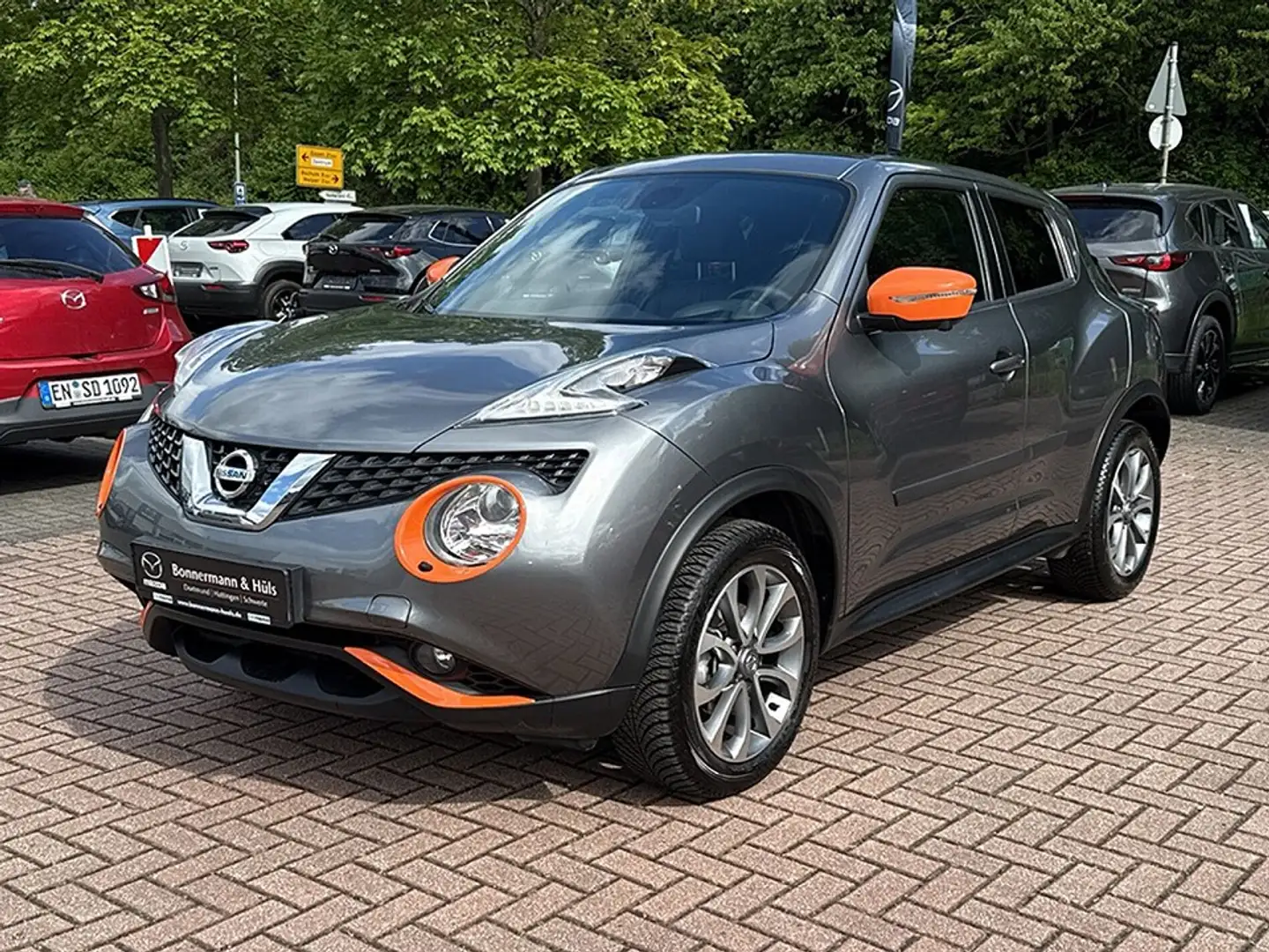 Nissan Juke 1.6 Tekna *360°*Navi*Leder* Grau - 1