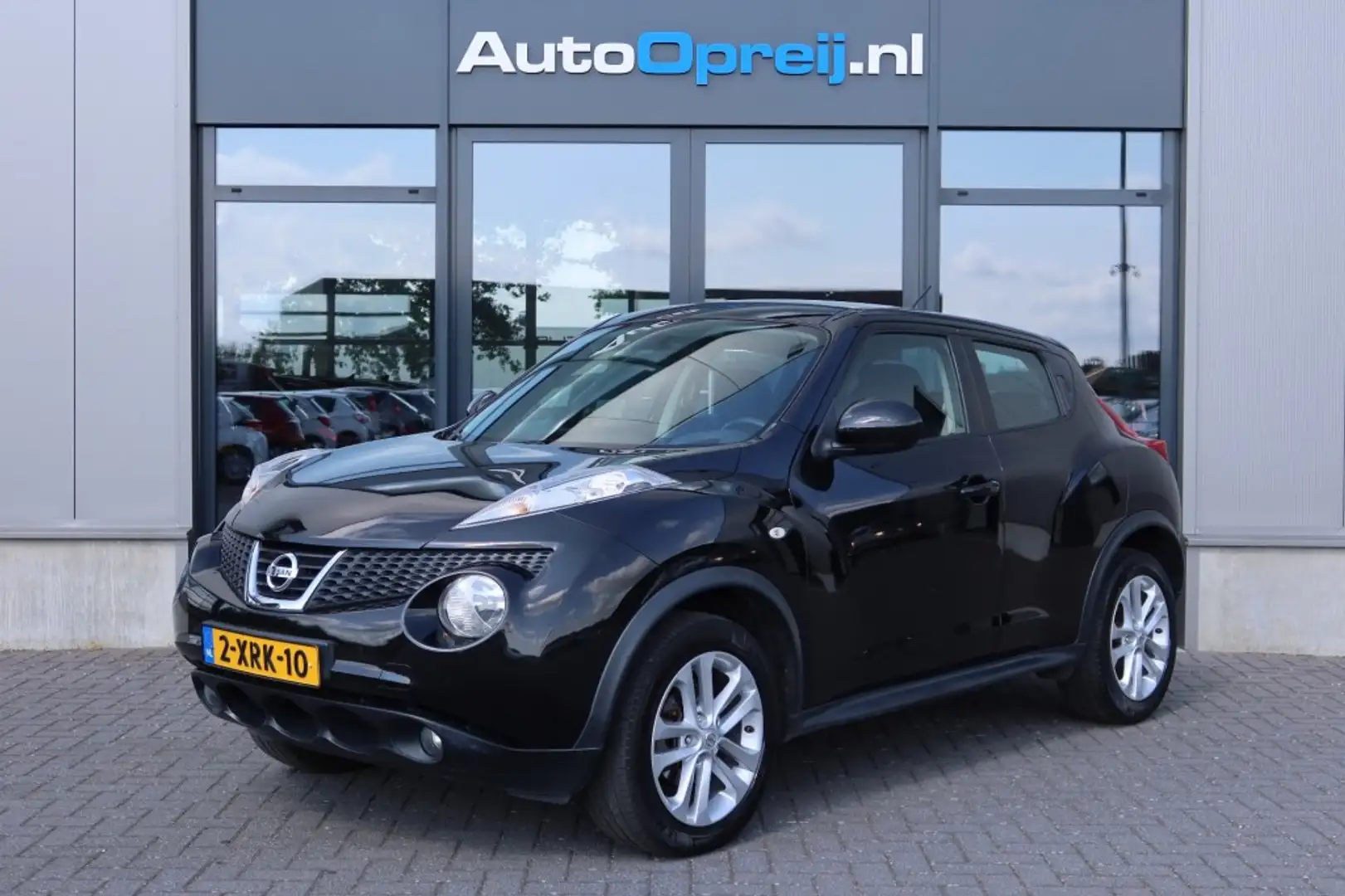 Nissan Juke 1.6 Tekna Clima, NAVI, Camera, Cruise, Trekhaak af Zwart - 1