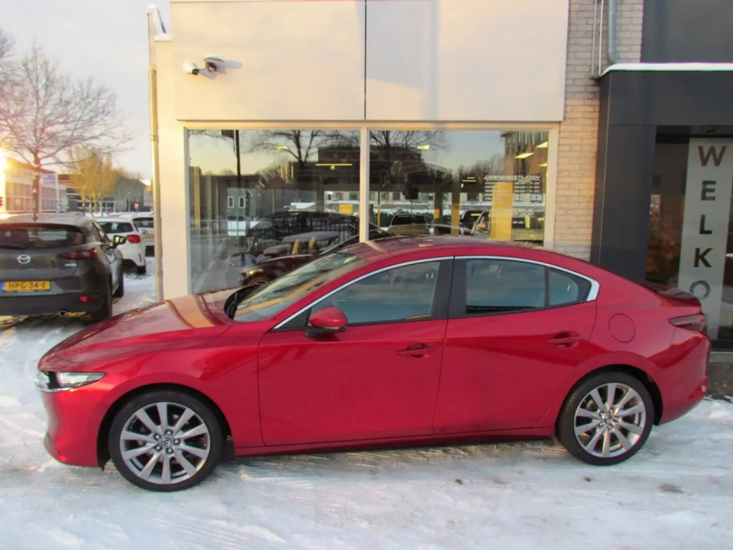 Mazda 3 2.0 E-Skyactiv-G 122pk M-Hybrid Comfort met BOSE Rouge - 1