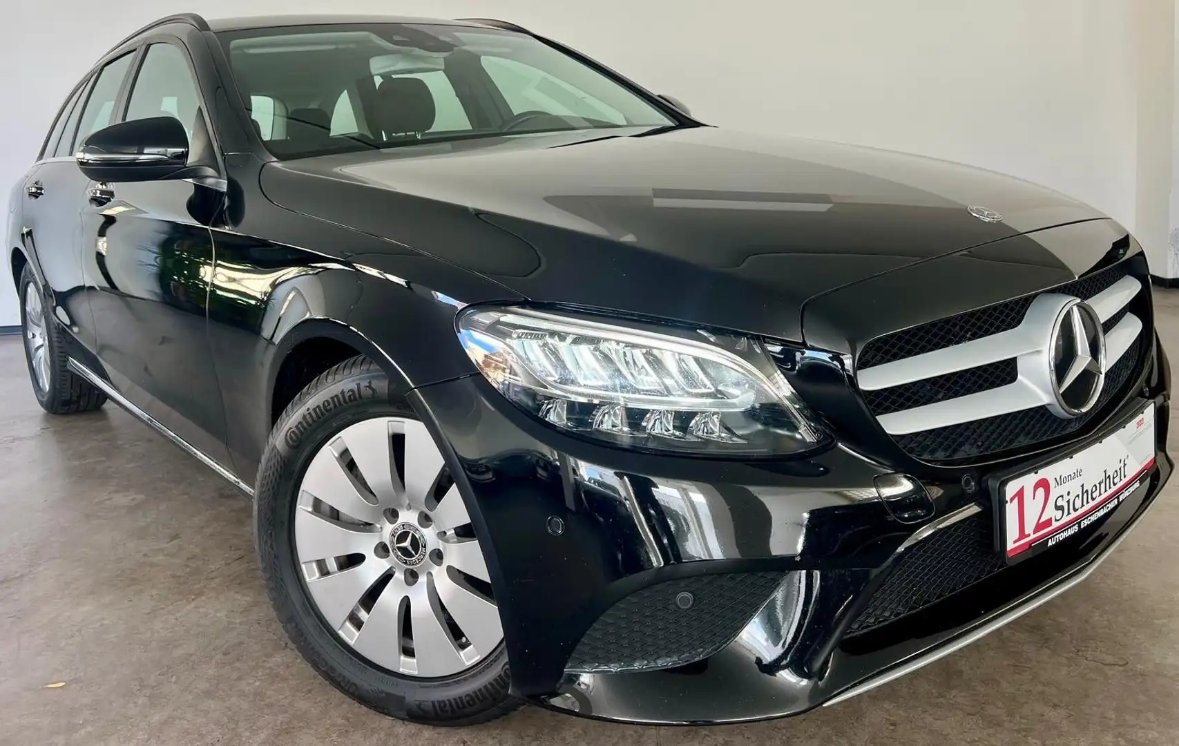 Mercedes-Benz C 180 T-Modell d AHK ACC NAVI 2xPDC Temp Shz Noir - 1