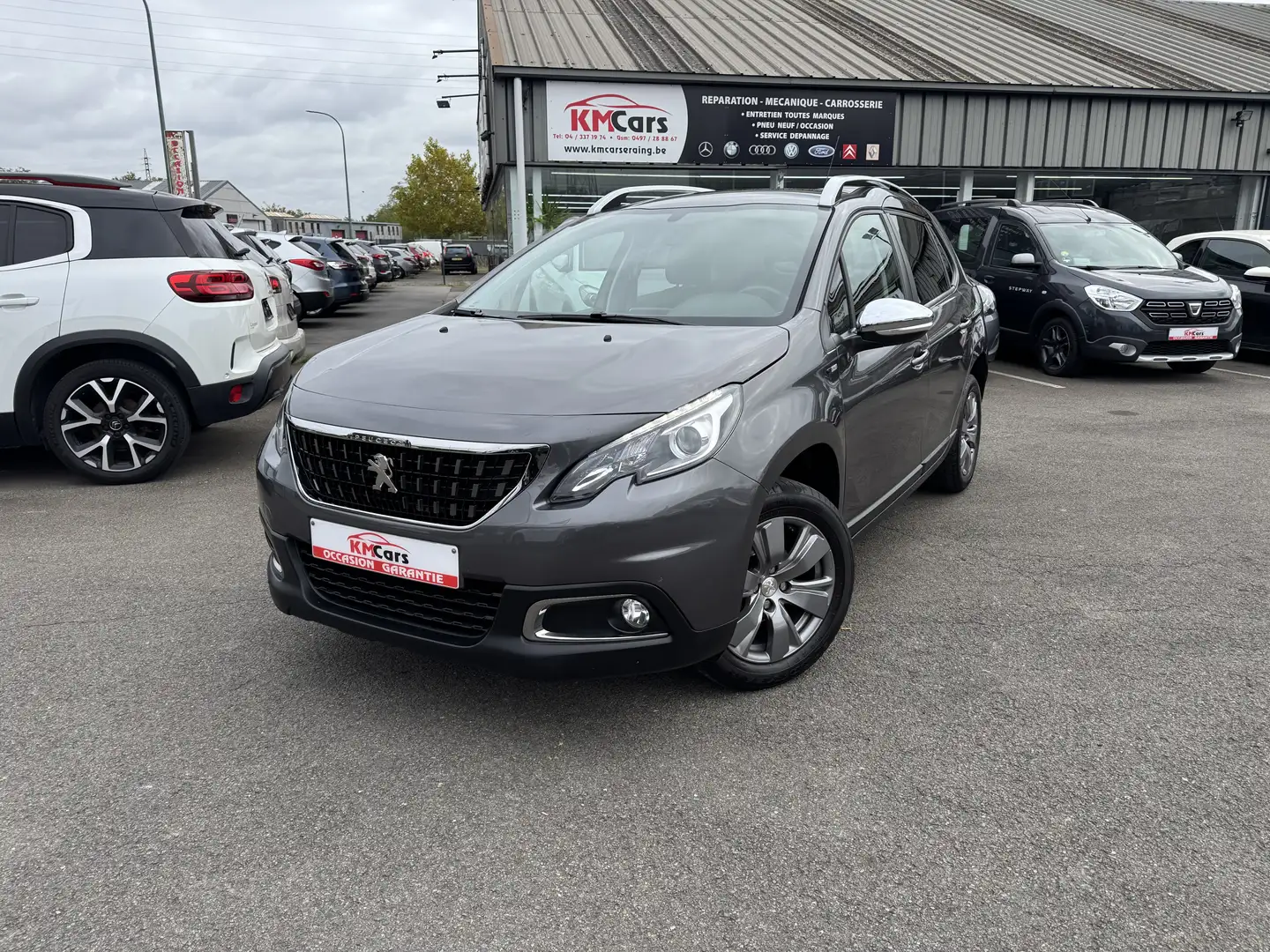 Peugeot 2008 1.2i ESSENCE /1'ier PROPRIETAIRE/AIRCO/NAVIGATION Gris - 1