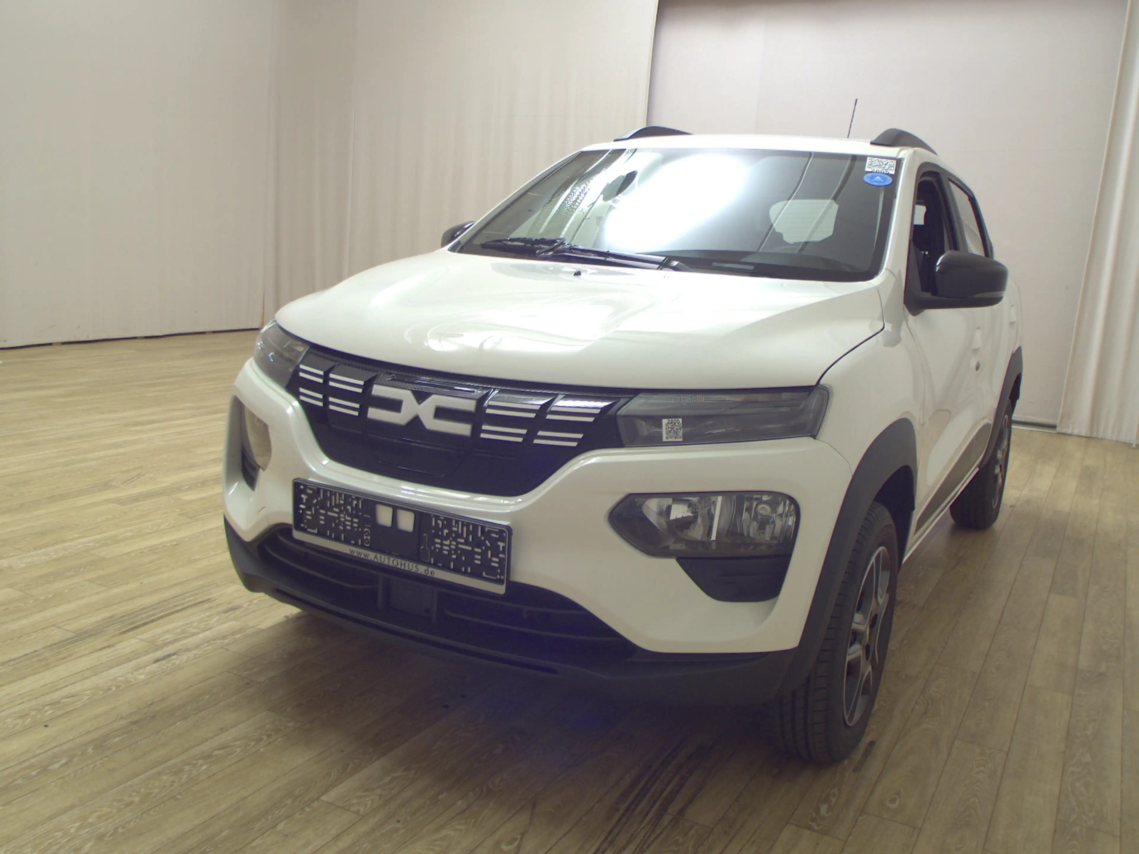 Dacia Spring Electric Essential Navi T-Leder PDC — photo 2