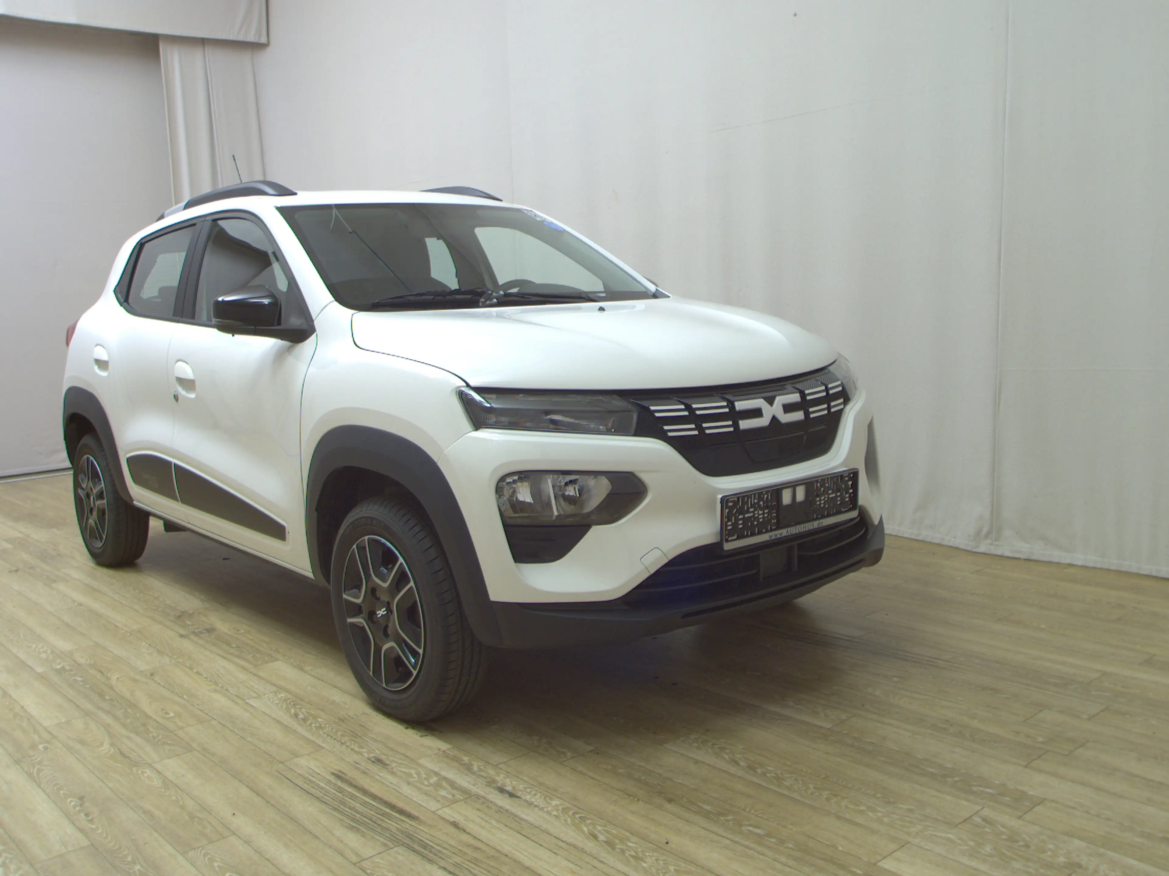 Dacia Spring Electric Essential Navi T-Leder PDC — photo 3