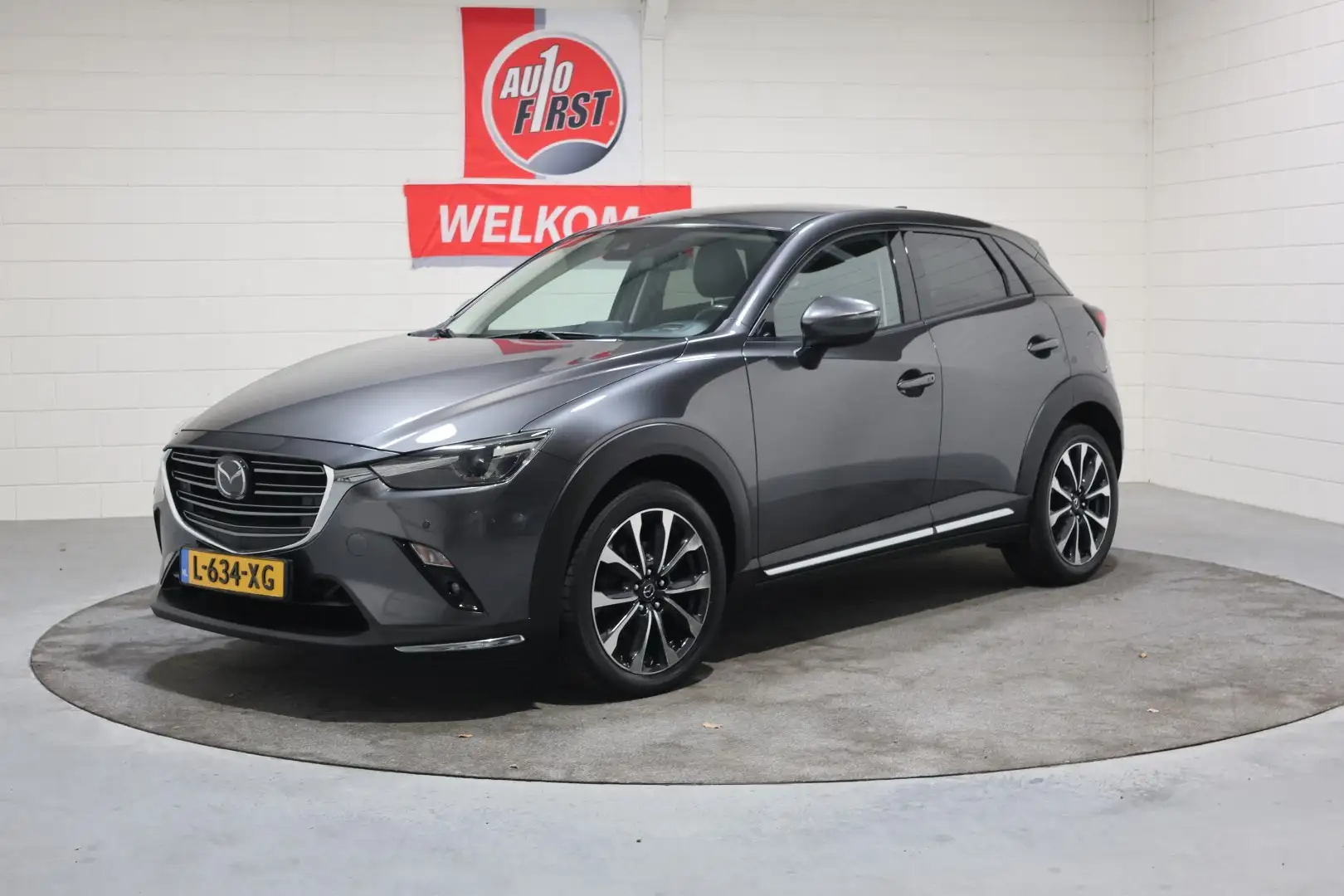 Mazda CX-3 2.0 SkyActiv-G 120 GT-M, Leer, Navigatie, Cruise c Grijs - 1