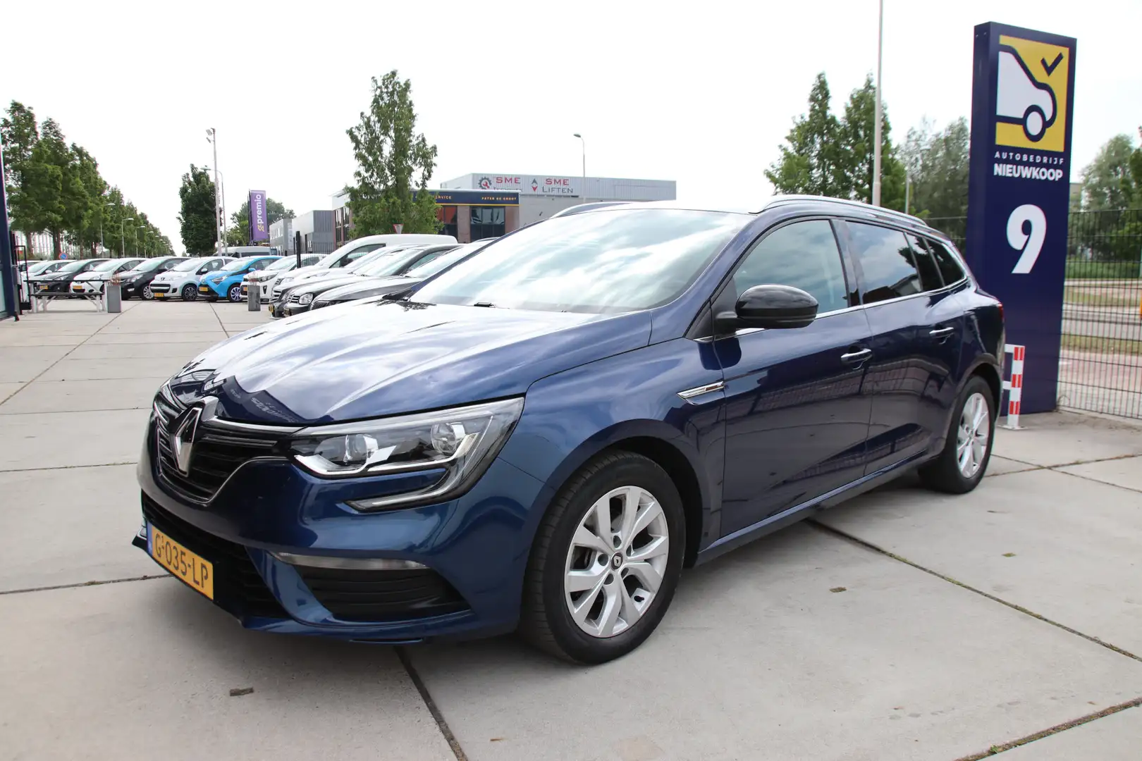 Renault Megane Estate 1.3 TCe Limited Clima, Carplay, Cruise, 1e Blauw - 1