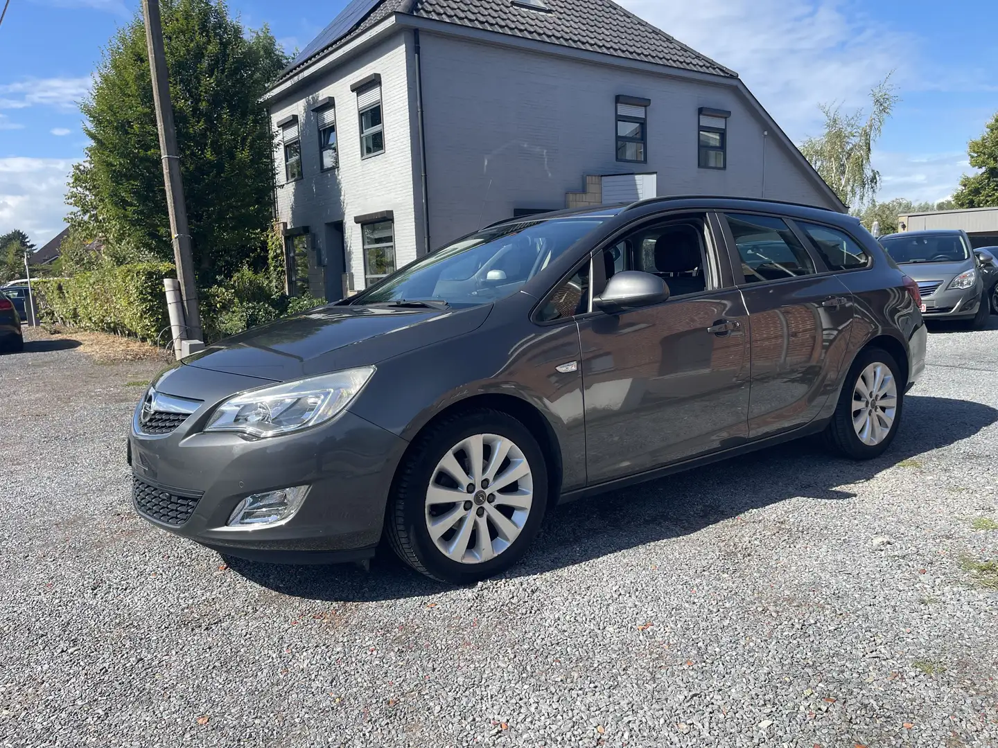 Opel Astra 1.6i  Sports Tourer Cosmo,Leder,Gps,Sensoren,... Gris - 1