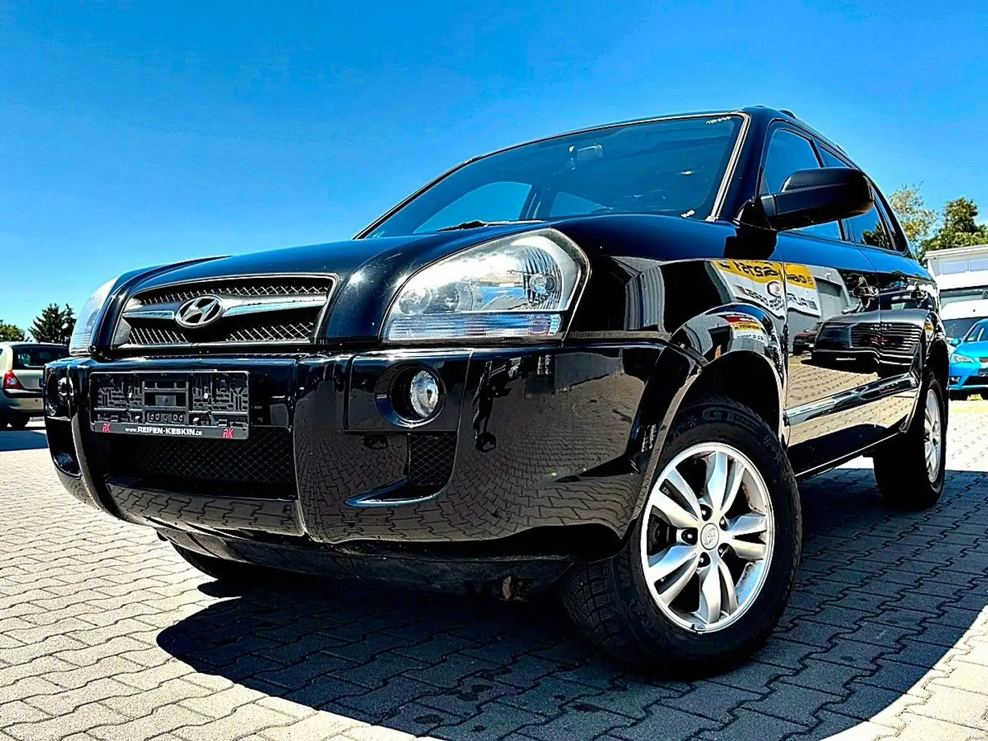 Hyundai TUCSON 2.0/SHZ/SCHIEBEDACH/LEDER/PDC/1 HAND Schwarz - 1
