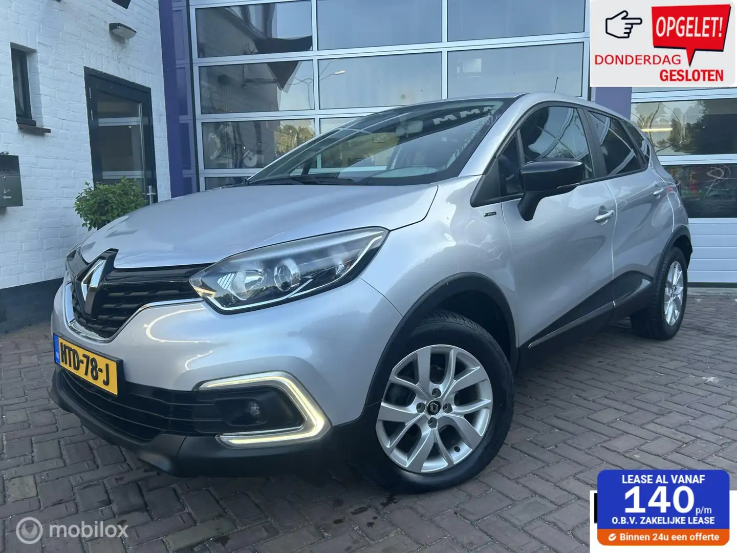 Renault Captur 0.9 TCe Limited * AIRCO * NAVIGATIE * CAMERA Grijs - 1