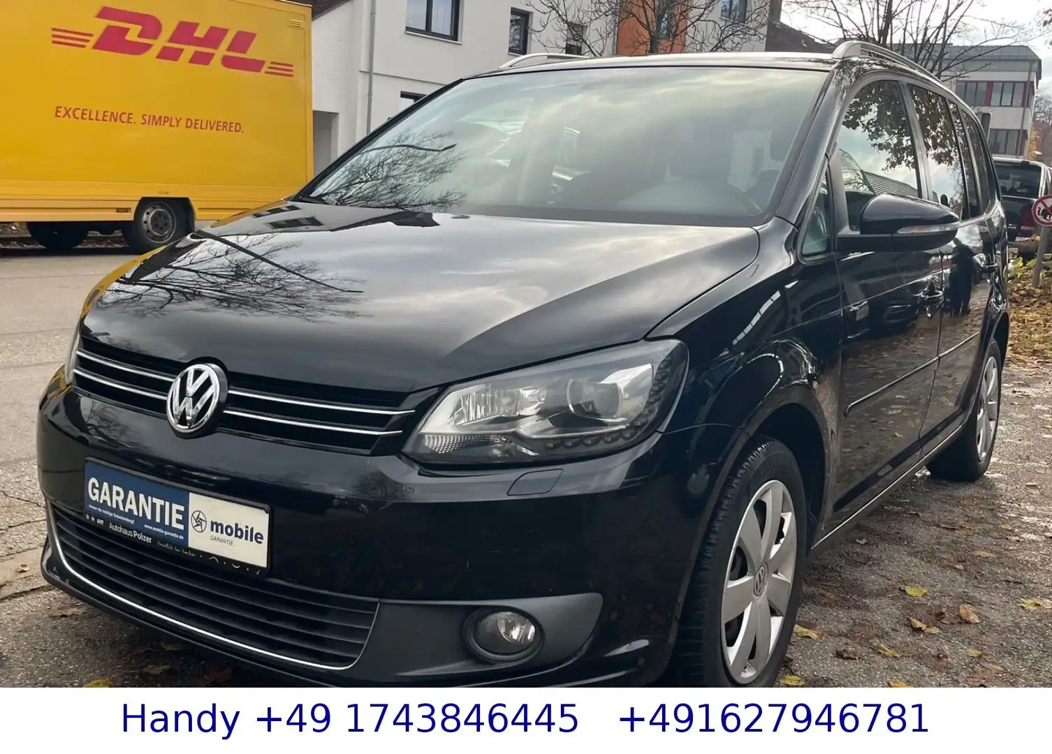 Volkswagen Touran 1.6 TDI DSG/7-Sitzer/NAVI/XENON/SHZ/TÜV Schwarz - 1