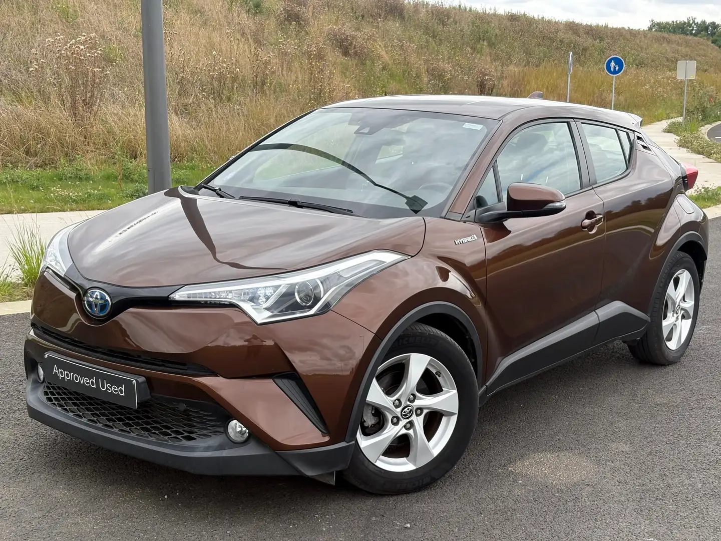 Toyota C-HR C-HR Hybrid 1.8i VVT-i GARANTIE NAVI AUTO JANTES A Brun - 1