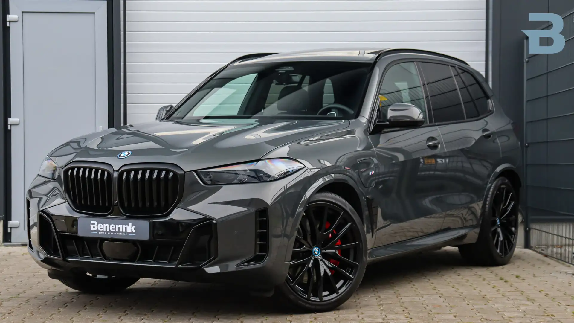 BMW X5 xDrive50e M-Sport Pro | Massage | Harman/Kardon | Grijs - 1