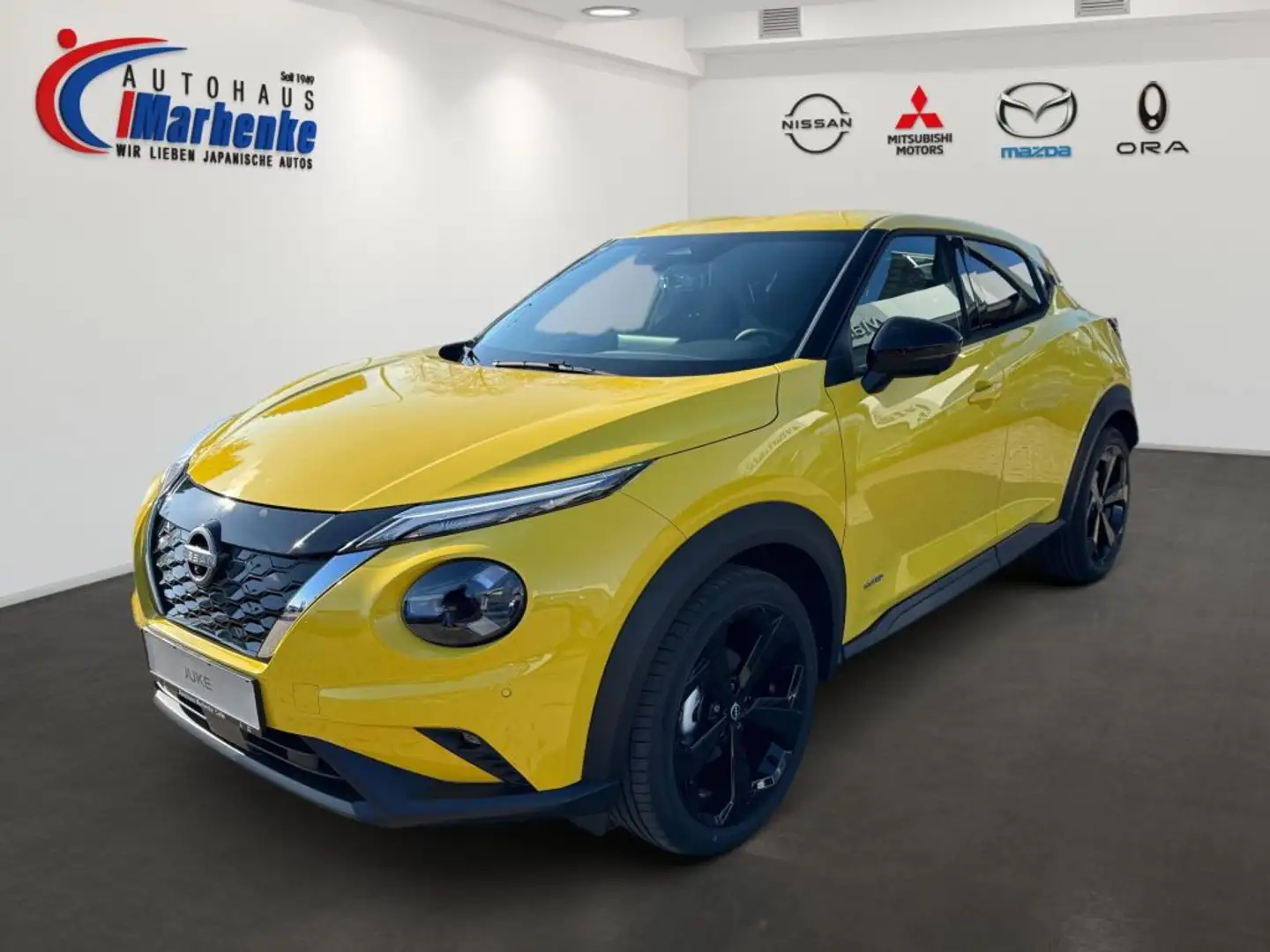 Nissan Juke 1.6 Hybrid 4AMT Tekna Gelb - 1