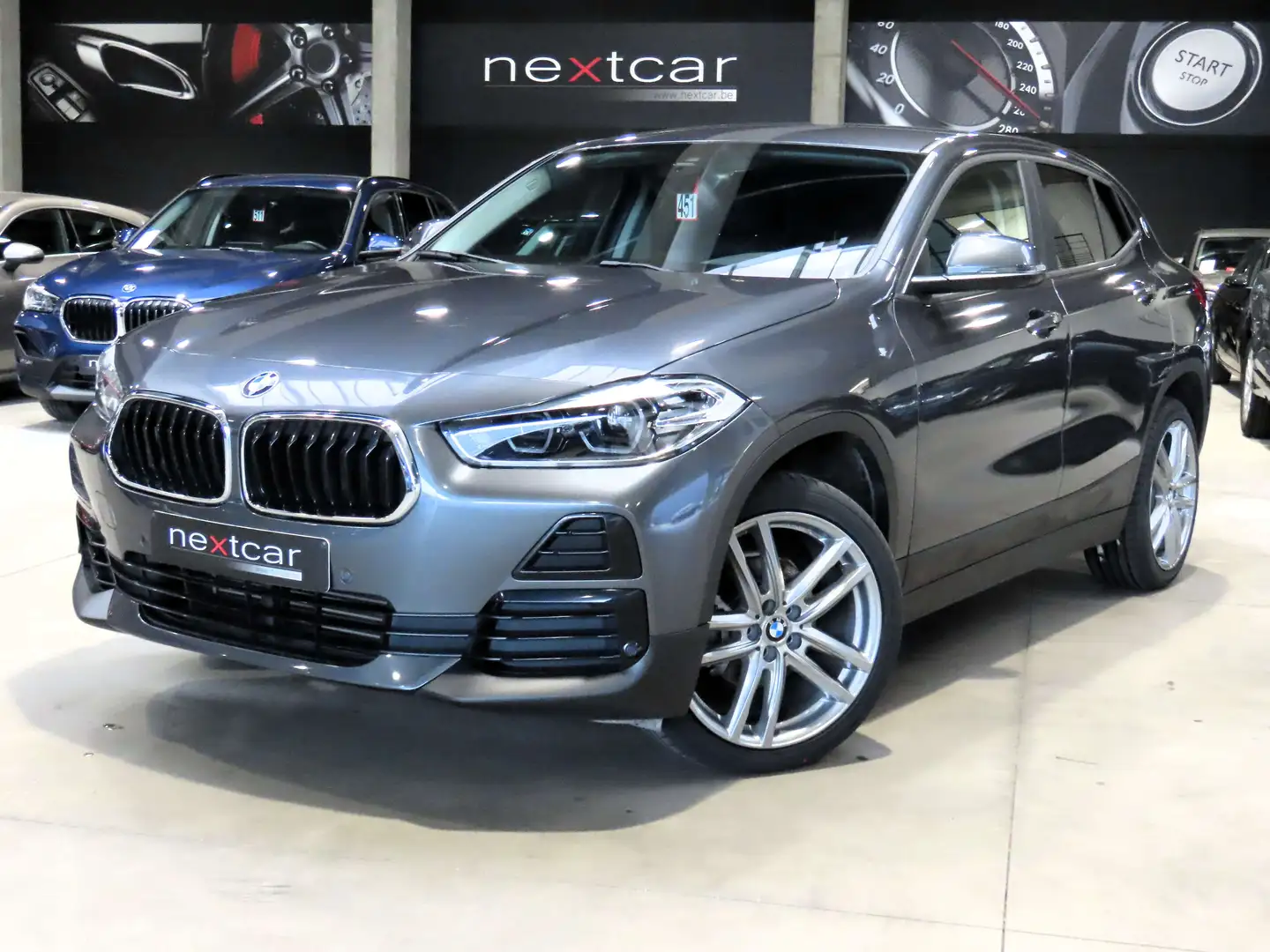 BMW X2 16d SDrive *KEYLESS-FULL LED-CUIR-NAVI PRO* Grijs - 1