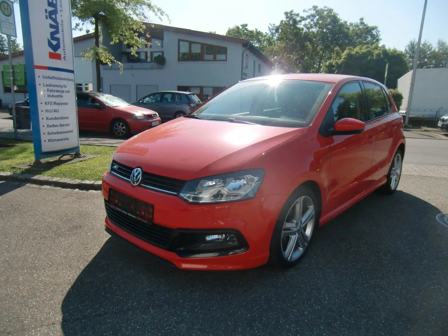 Volkswagen Polo V Lounge BMT/Start-Stopp/Navi/PDC/Sitzh/8f. Rosso - 1