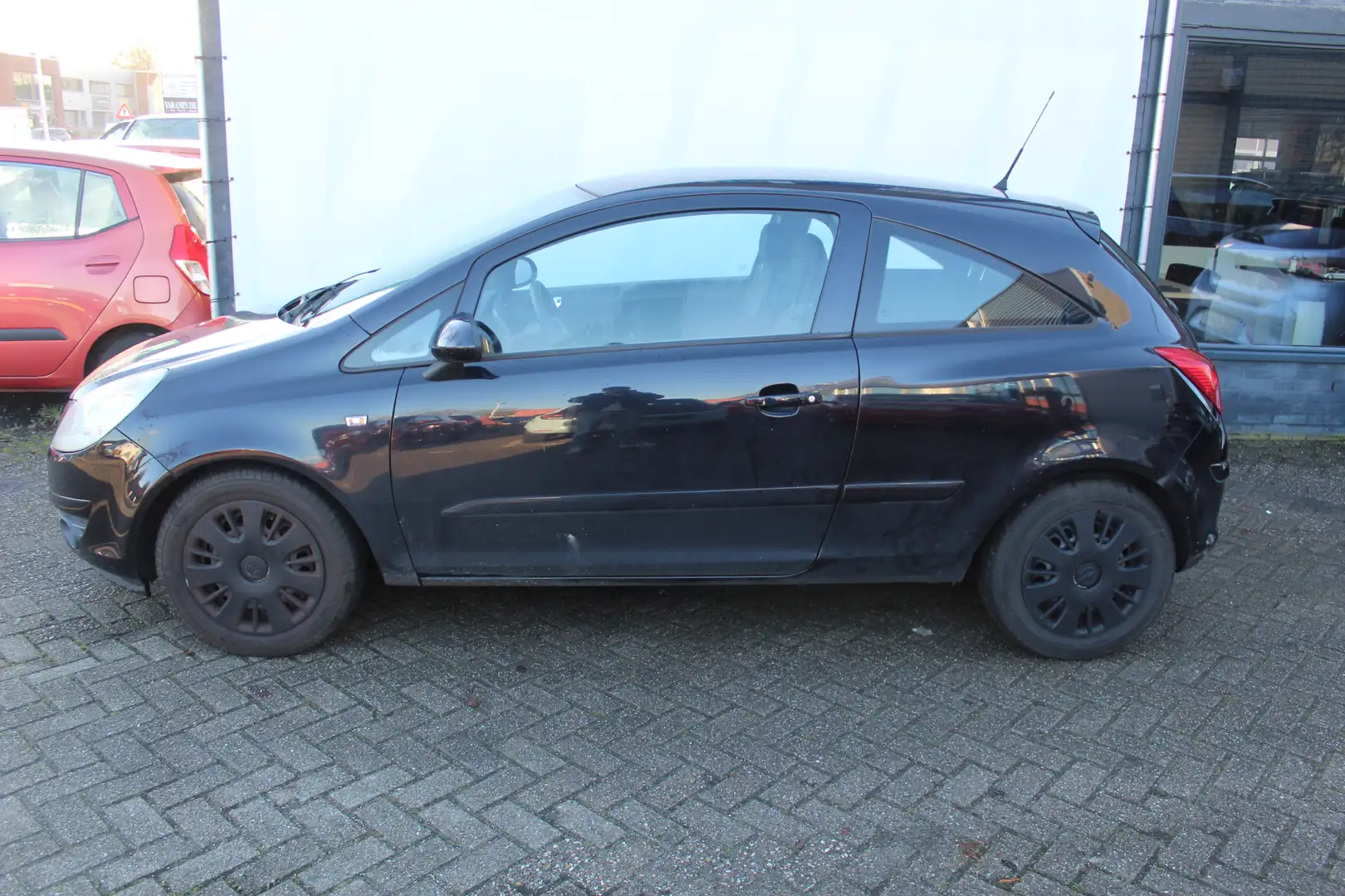 Opel Corsa 1.2-16V Enjoy Handel prijs, zo meenemen Schwarz - 2