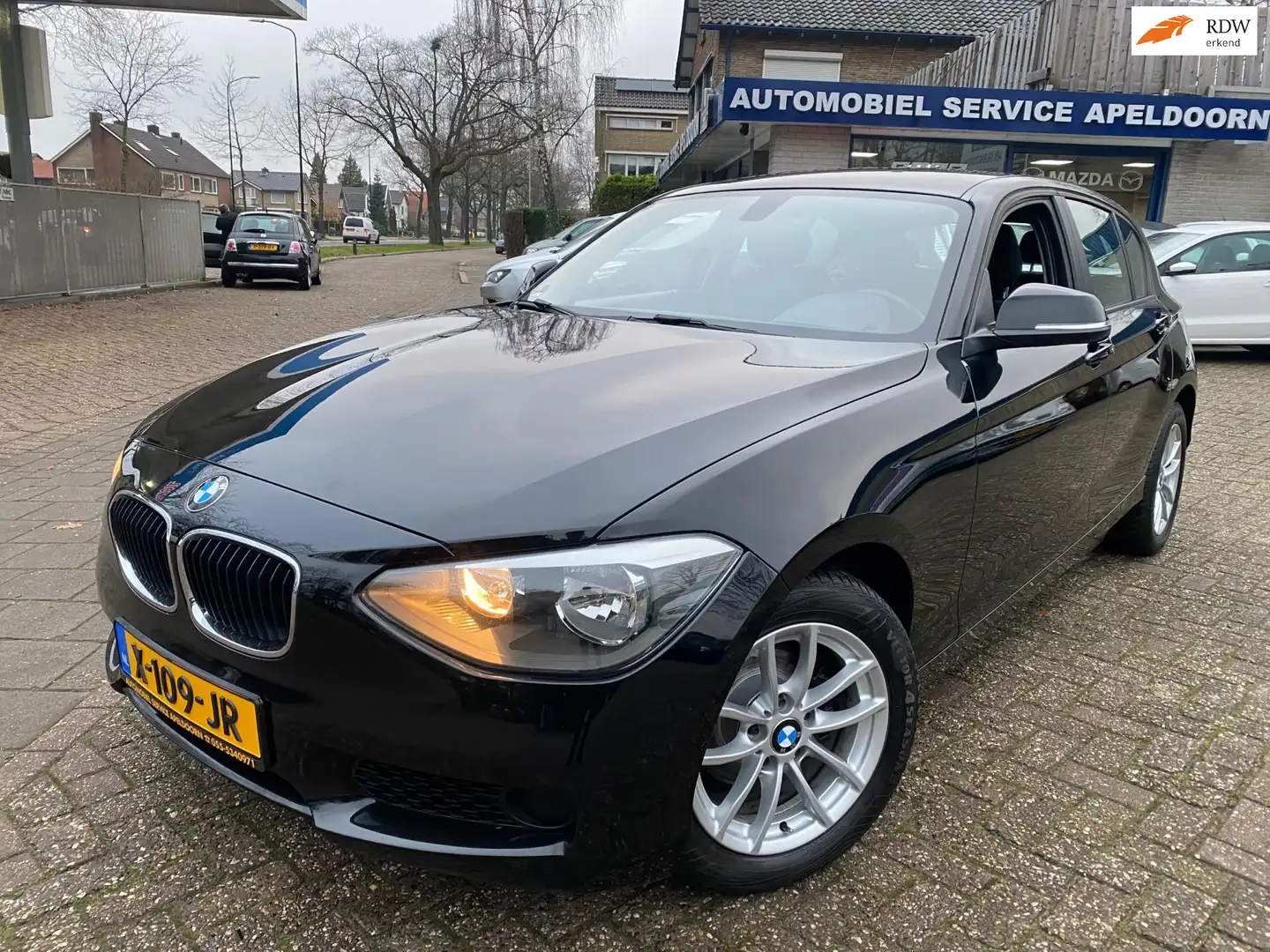 BMW 116 1-serie 116i Business+ * PDC|STOELVERW.|CLIMA|6 BA Zwart - 1